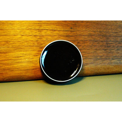 Vibrant wax paint by Wicked Sensory for brush-on temperature play.